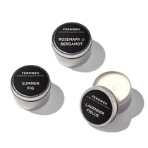 Three Mediterranean Garden travel candle tins on white background